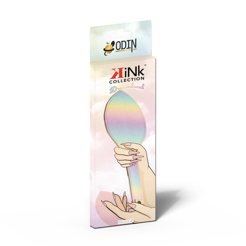 Kink Dreamland Pastel Glitter Spanking Paddle packaging featuring pastel colors and glitter for playful impact scenes.
