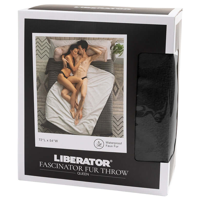 Liberator Fascinator Fur Throw Queen Black packaging featuring a couple on a bed with a luxurious faux fur throw.