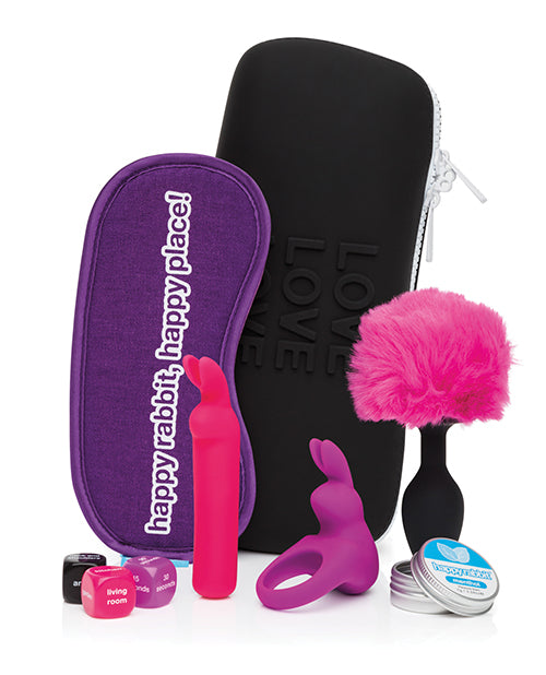 Happy Rabbit Couples Pleasure Kit 7 Piece Black featuring colorful toys and accessories for enhanced pleasure.