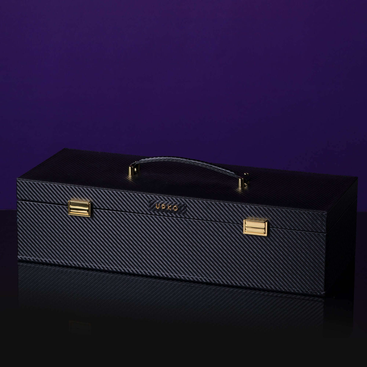 Luxurious black bondage accessory case with gold accents, perfect for storing BDSM tools and accessories.