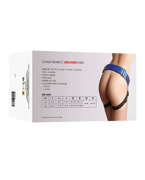 Strap On Me Leatherette Curious Harness Metallic Blue packaging with adjustable belts and size guide.