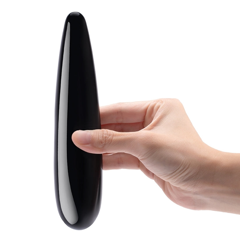 Le Wand Crystal Wand Black Obsidian Probe held in hand, showcasing its sleek design.