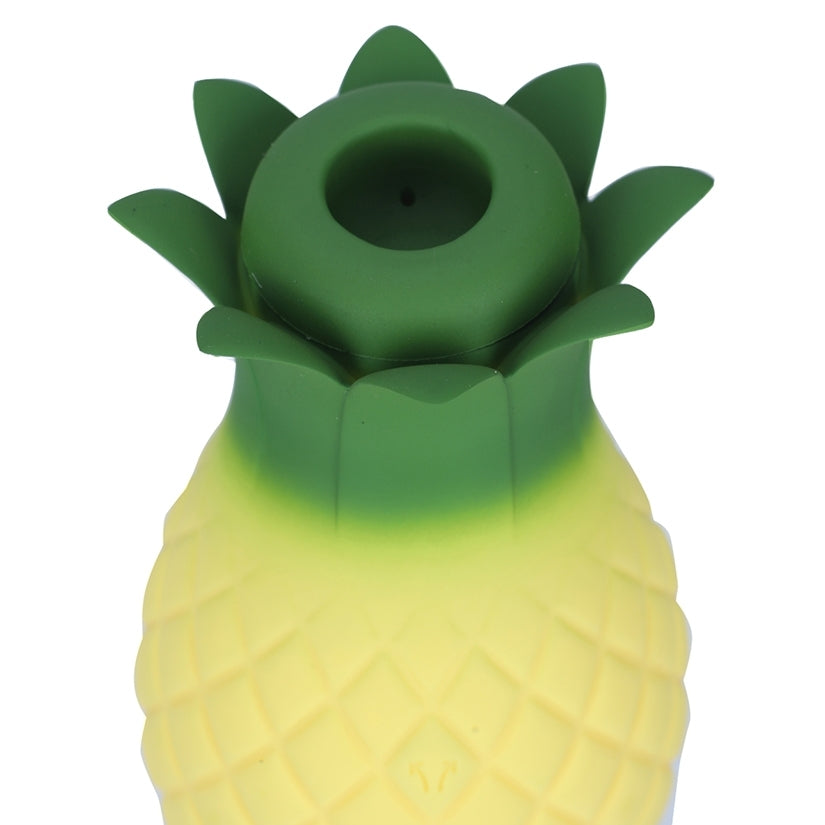 Maia Aloha Suction & Vibrating Pineapple Vibrator top view with green leaves and yellow body.