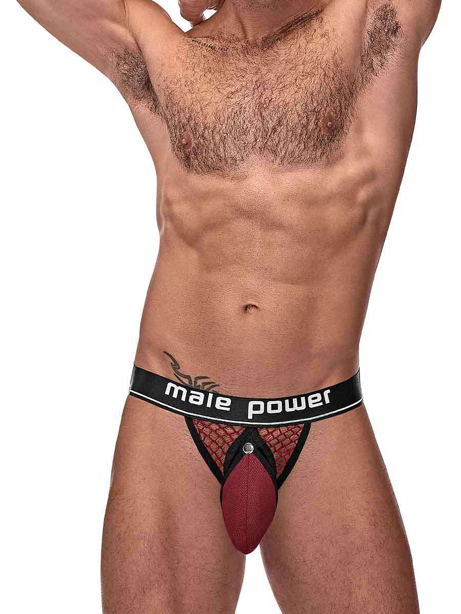 Model wearing Cock Pit Cock Ring Jock Burgundy S/M showcasing its bold fishnet design and elastic cock ring.