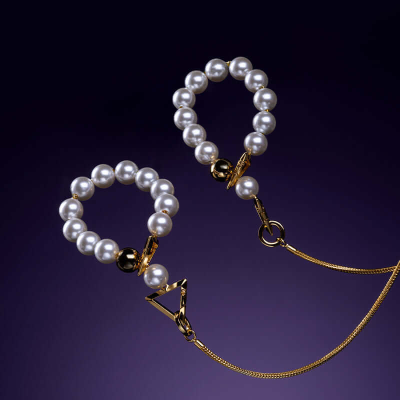 Luxurious pearl anklet with gold accents by UPKO, featuring a unique design for elegant fashion statements.
