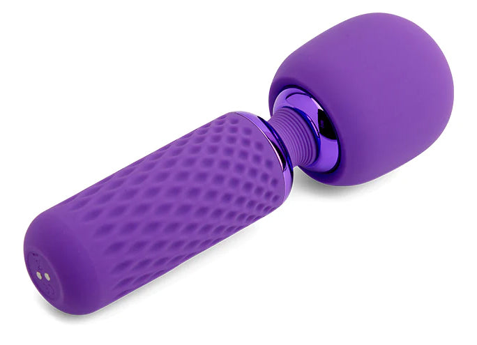 Sensuelle Nubii Harlow Mini Wand with Attachment Purple on a white background, showcasing its compact design and vibrant color.