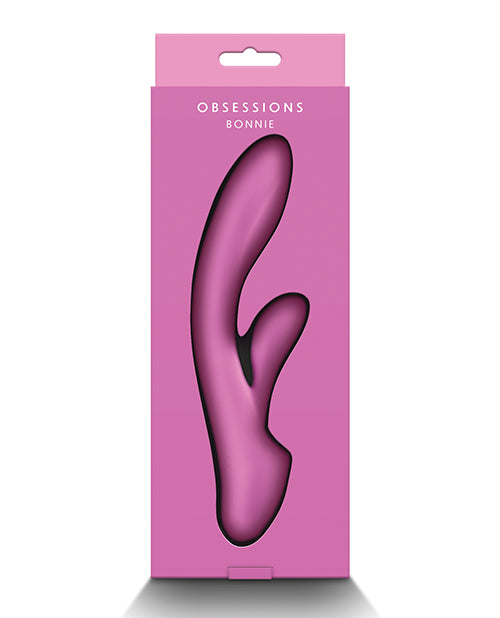 Obsessions Bonnie Vibe Light Pink silicone vibrator in packaging, designed for pleasurable experiences with its soft curves.