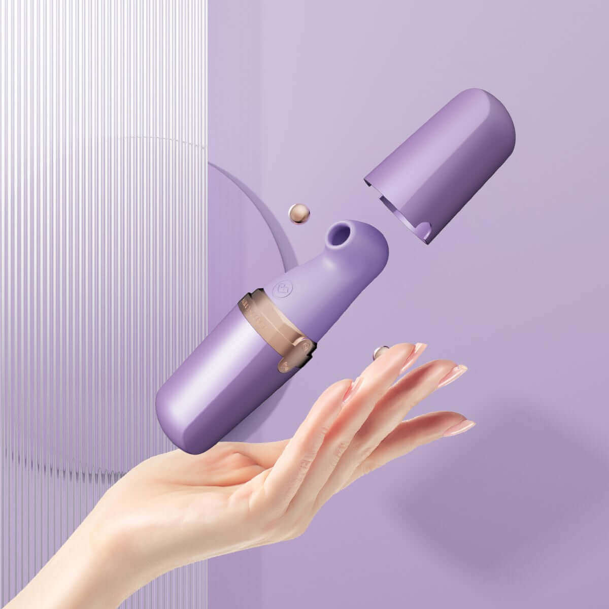 Sweet Secret Dual Massager Purple displayed in a hand, showcasing its sleek design and dual stimulation features.