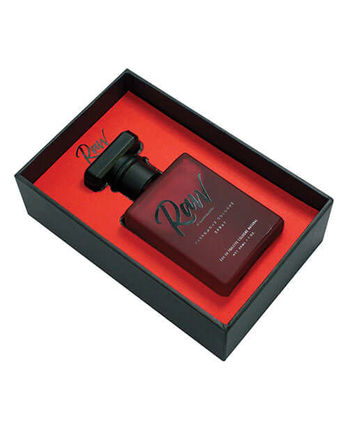 Raw by Raw Chemistry Mens Pheromone Cologne 1 Oz in a stylish box with red accents.