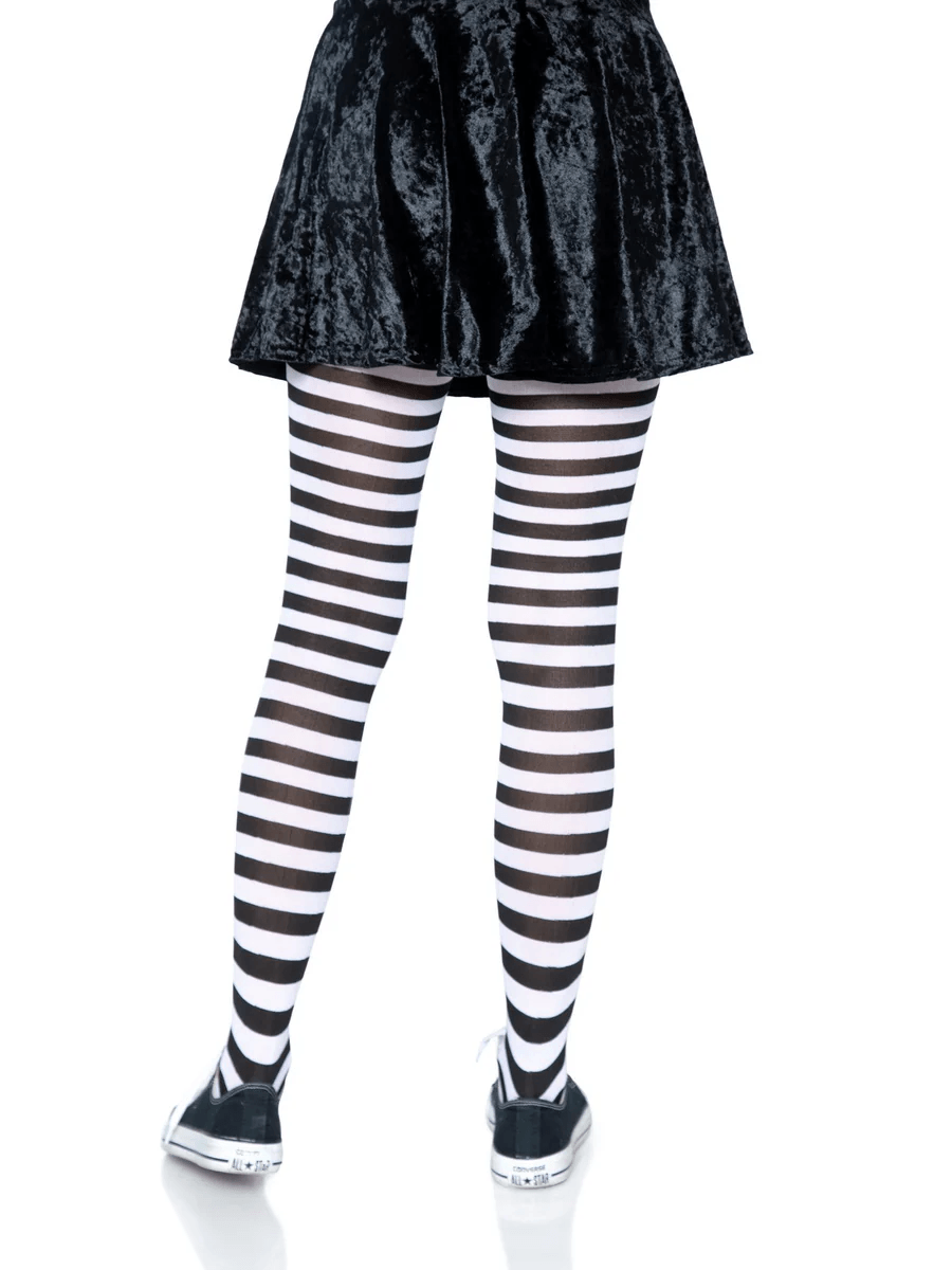 Leg Avenue Nylon Striped Tights Black White OS worn with a black skirt, showcasing the bold black and white striped pattern.