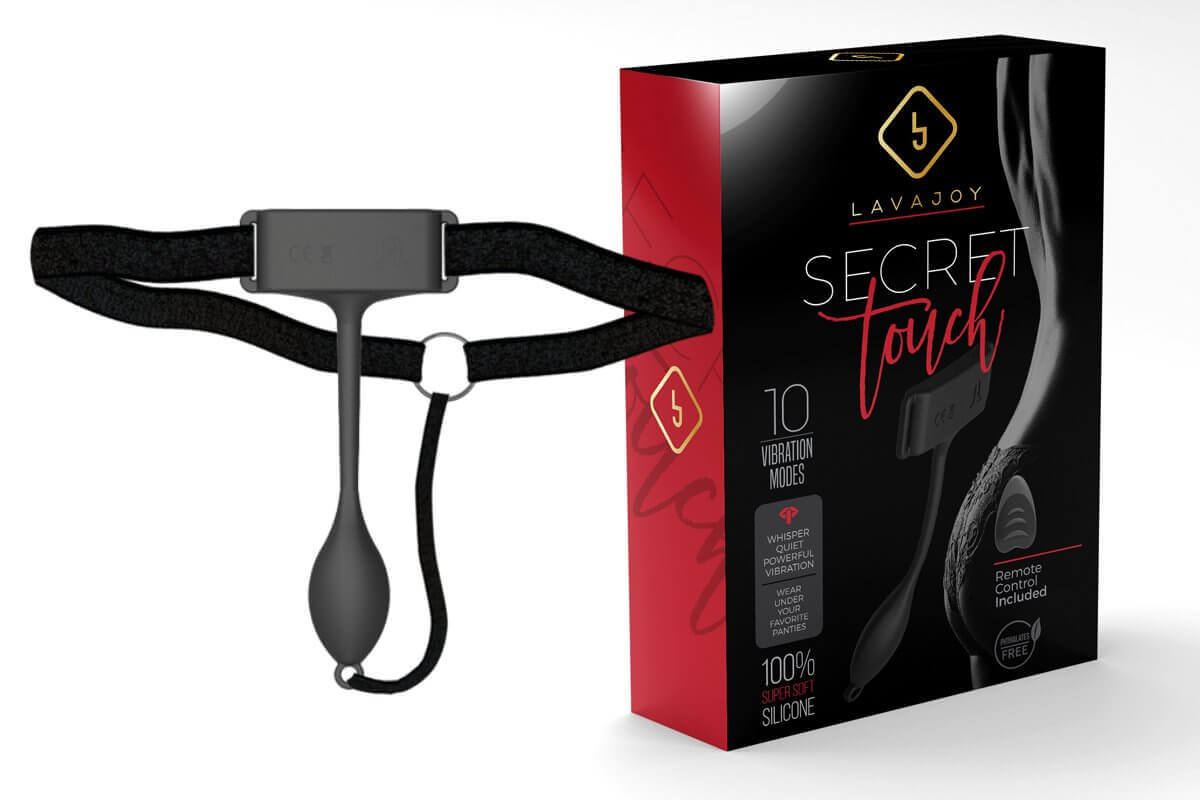 Secret Touch Vibrating Panty Vibe with Remote Control next to its packaging, showcasing design and features.