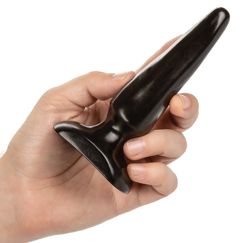 Colt Anal Trainer Kit Butt Plugs held in hand, showcasing the tapered design and texture for beginners.
