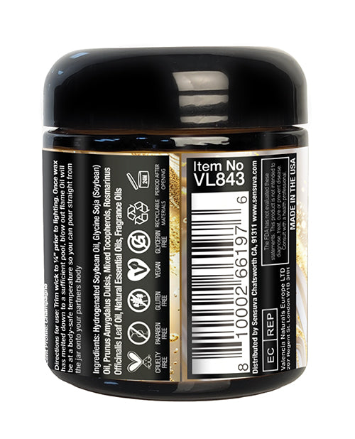 Sensuva Lit Champagne Luxury Massage Candle 4 Oz jar with ingredients and details on the label.