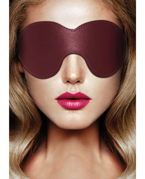 Shots Ouch Halo Eyemask Burgundy showcasing a luxurious burgundy leather look, enhancing sensory play.