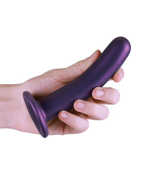 Shots Ouch 6 inch Smooth G-Spot Dildo Metallic Purple held in hand, showcasing its sleek design.