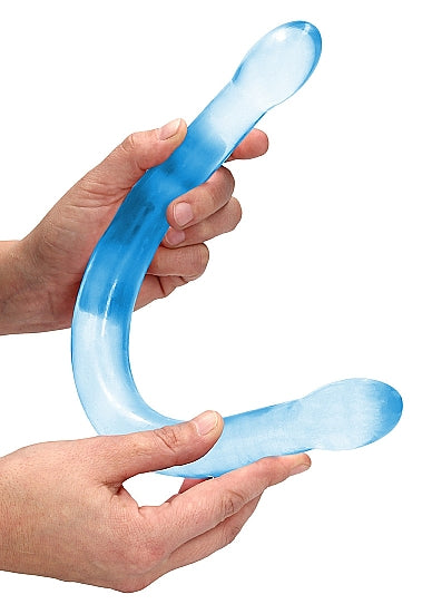 Realrock Non Realistic Double Dong 17 inch Blue being held, showcasing its double-ended design and translucent material.