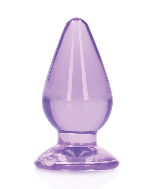 Shots RealRock Crystal Clear 4.5 inch Anal Plug Purple displaying a translucent purple design with a tapered tip and suction cup base.