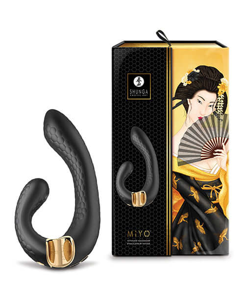 Shunga Miyo Intimate Massager Black beside its elegant packaging designed for dual stimulation pleasure.