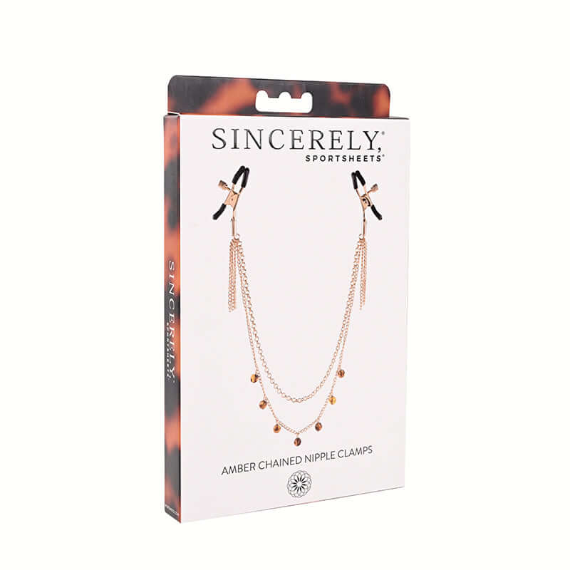 Sincerely Amber Chain Nipple Jewelry packaging featuring elegant amber chained nipple clamps for sensual allure.