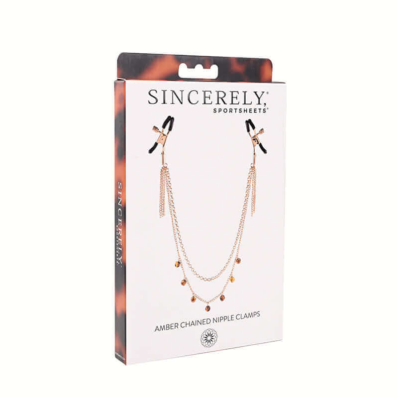 Sincerely Amber Chain Nipple Jewelry packaging featuring elegant amber chained nipple clamps for sensual allure.
