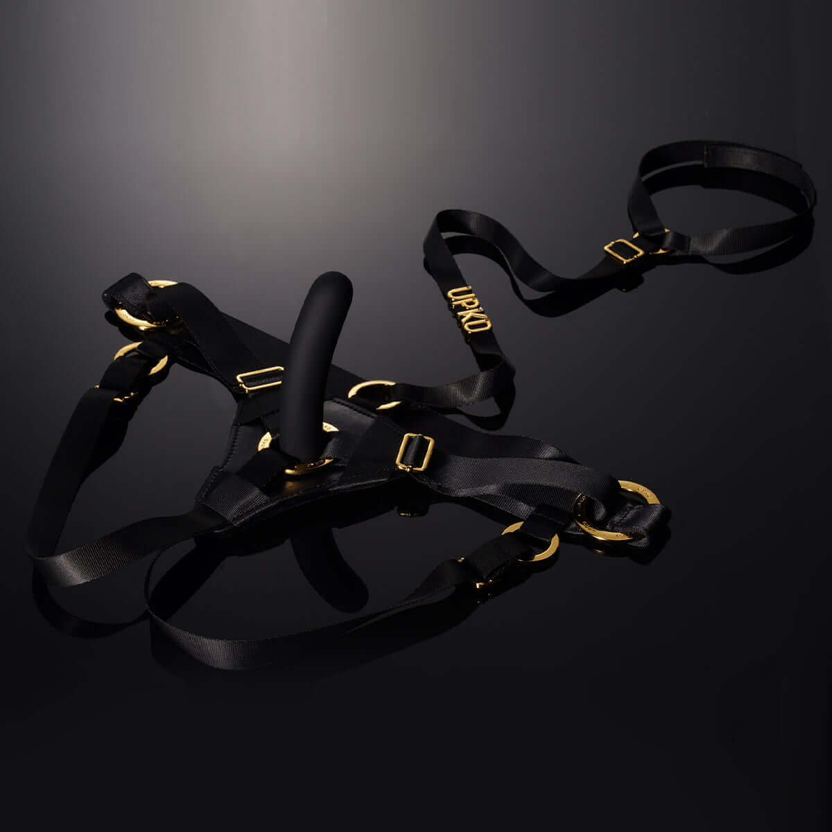 UPKO Strap-on Harness Kit with innovative neck link and double triangle structure for stability and precision, shown on a black background.