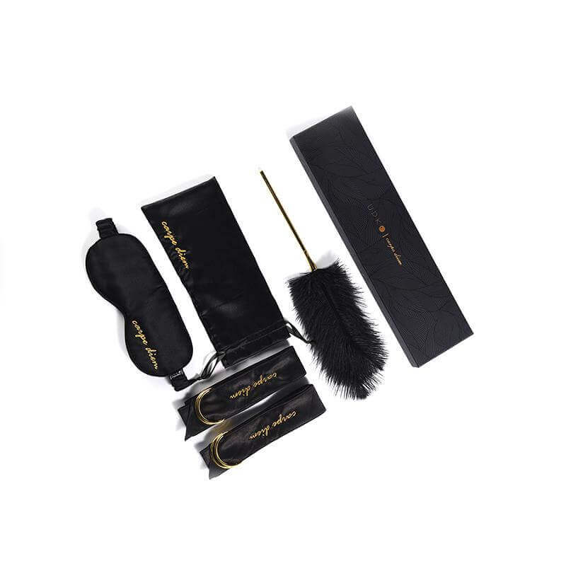Carpe Diem Premium Silk Bondage Set by UPKO featuring silk blindfold, satin storage bag, and feather tickler.