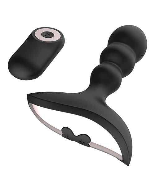 Gender Fluid Shake Anal Vibe with Remote Black featuring silicone design and detachable remote control.