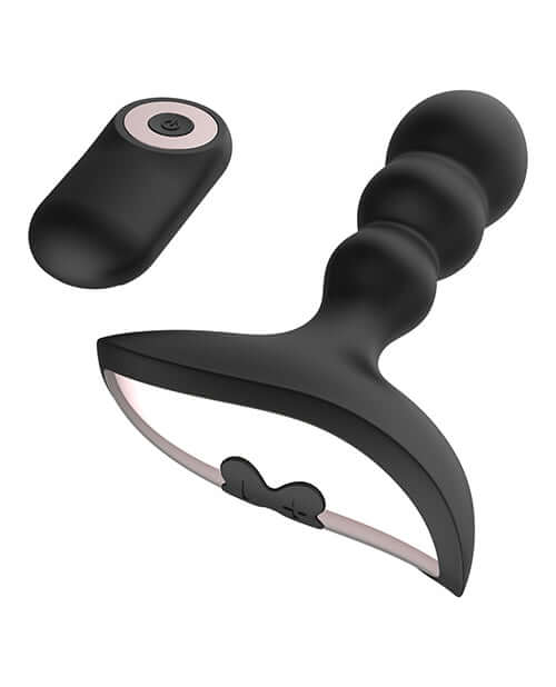 Gender Fluid Shake Anal Vibe with Remote Black featuring silicone design and detachable remote control.