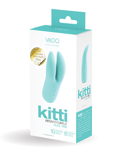 Vedo Kitti Rechargeable Vibe Turquoise packaging showcasing dual-eared clitoral stimulator with 10 vibration modes.