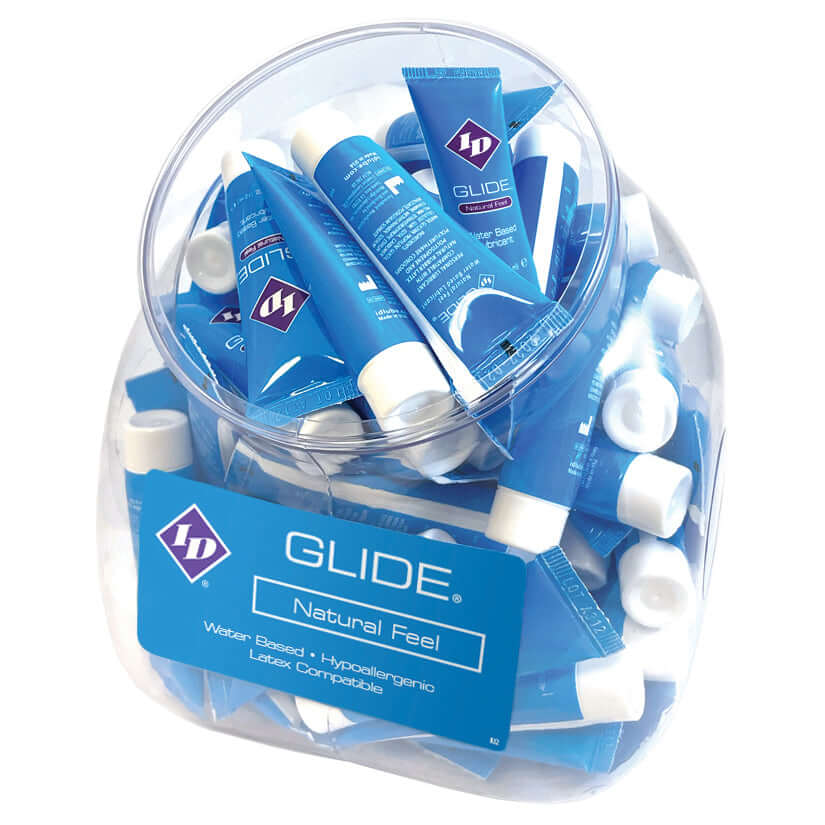 ID Glide Natural Feel Lubricant 12 ml Tubes Bowl Of 72 displayed in a clear container.