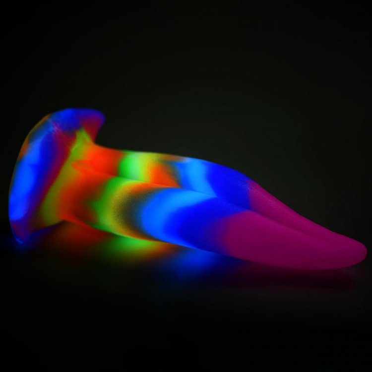 Creature Cocks Unicorn Kiss Glow In The Dark Tongue Dildo with vibrant colors glowing under blacklight.
