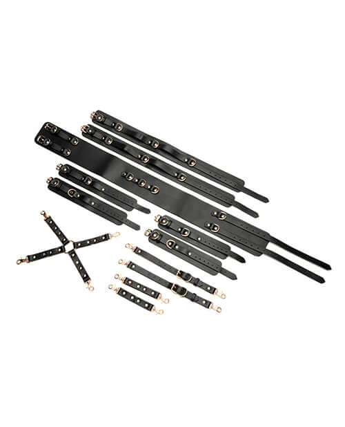 Master Series Tied Temptress Thigh Harness Hog Tie Black restraint system with straps and gold accents.