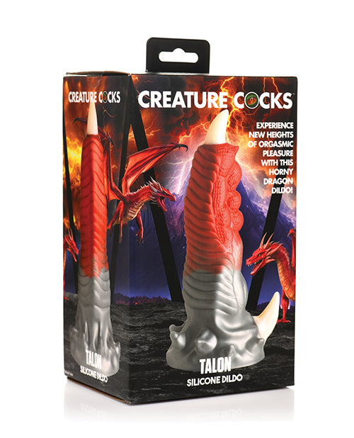 Creature Cocks Talon Fantasy Silicone Dildo in its packaging, showcasing a dragon-themed design with vibrant colors.