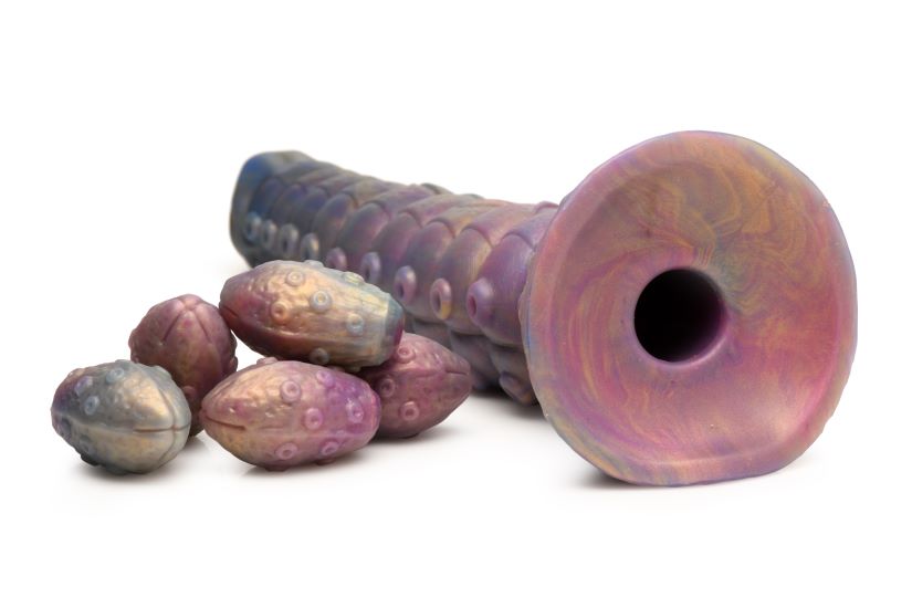 Creature Cocks Deep Invader Ovipositor Dildo with Eggs in vibrant colors alongside alien eggs.