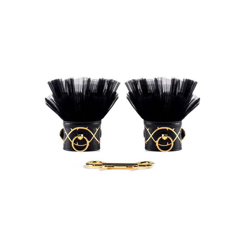 Luxurious black leather handcuffs adorned with gold detailing from the ZALO & UPKO Doll Designer Collection.