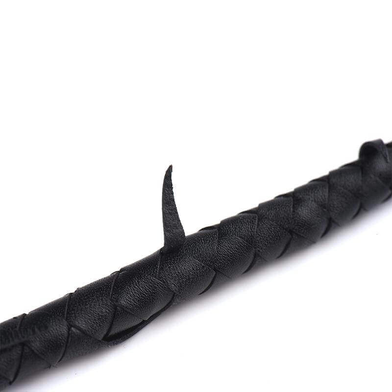 Close-up of ZALO & UPKO Designer Collection Leather Thorn Whip with intricate black leather detail and thorn pattern.