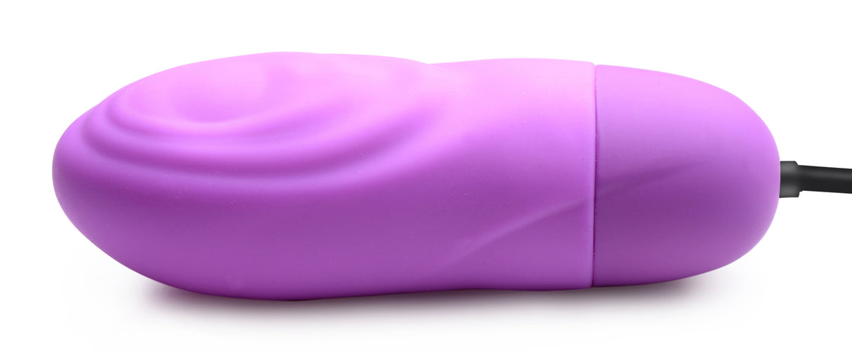 Bang 7X Pulsing Rechargeable Silicone Vibrator Purple shown from the side, featuring a smooth, curved design.