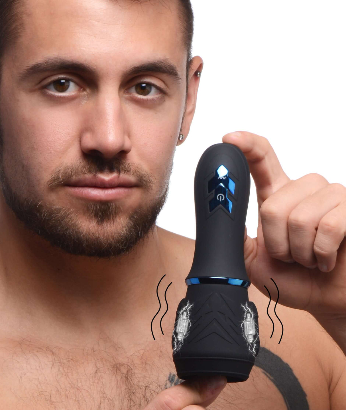 Man holding Master Series 10X Turbo Silicone Penis Head Pleaser, a rechargeable male stimulator with dual motors.