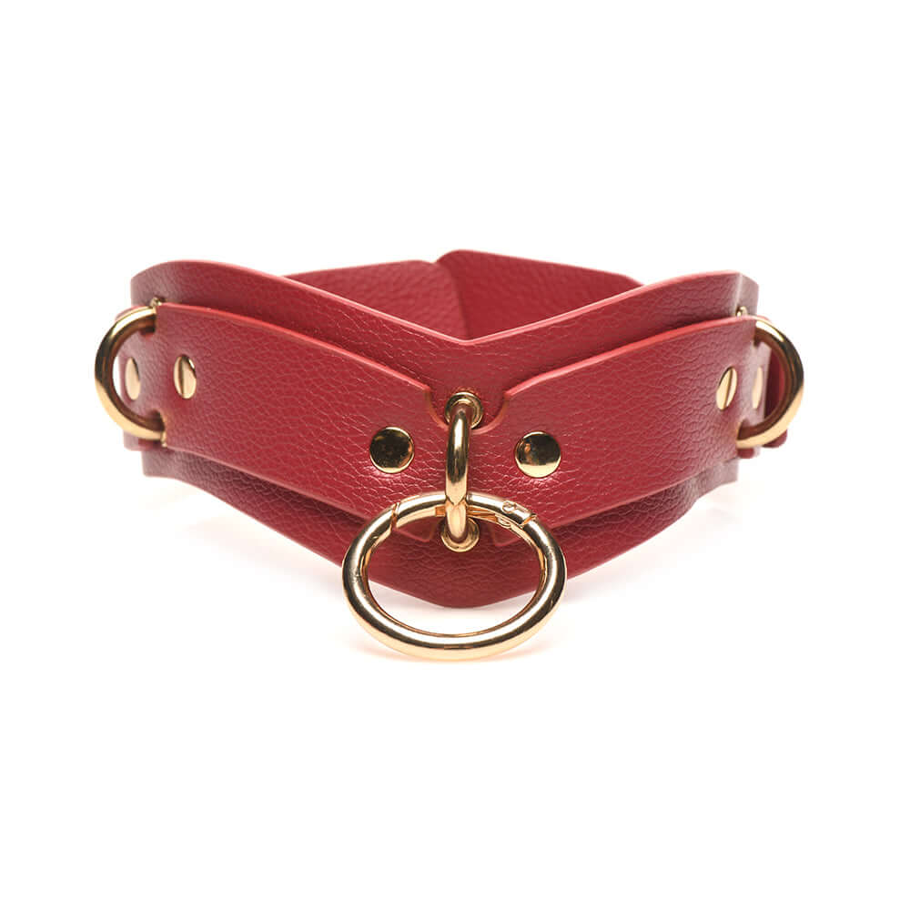 Red vegan leather collar with gold hardware, adjustable for comfort, part of the Bedroom Bliss Lover's Restraints Set.