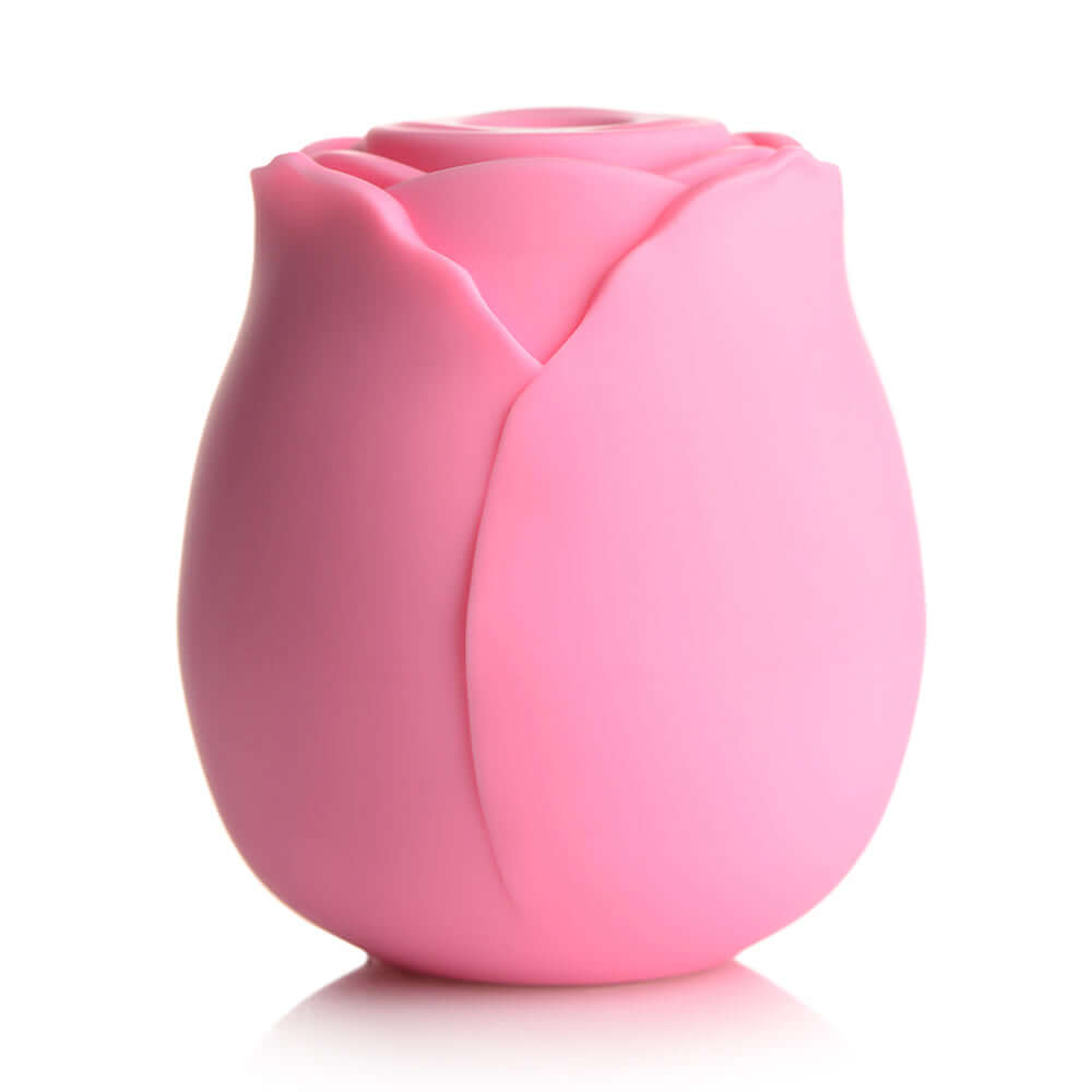 Bloomgasm 10X Wild Rose Silicone Suction Clit Stimulator in pink, shaped like a rose, designed for intimate pleasure.