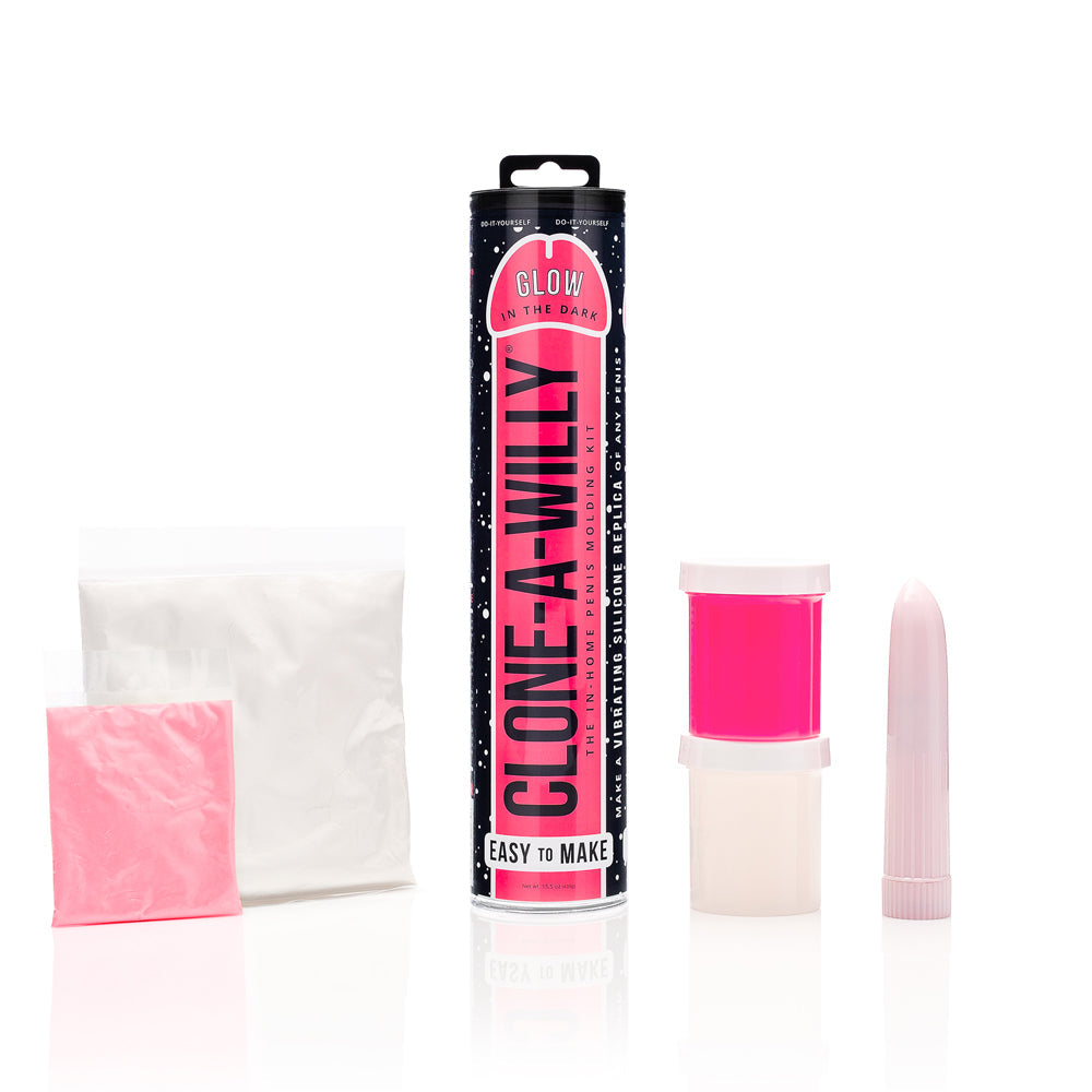 Clone-A-Willy DIY vibrating dildo kit in glow-in-the-dark hot pink, with molds and silicone materials displayed.