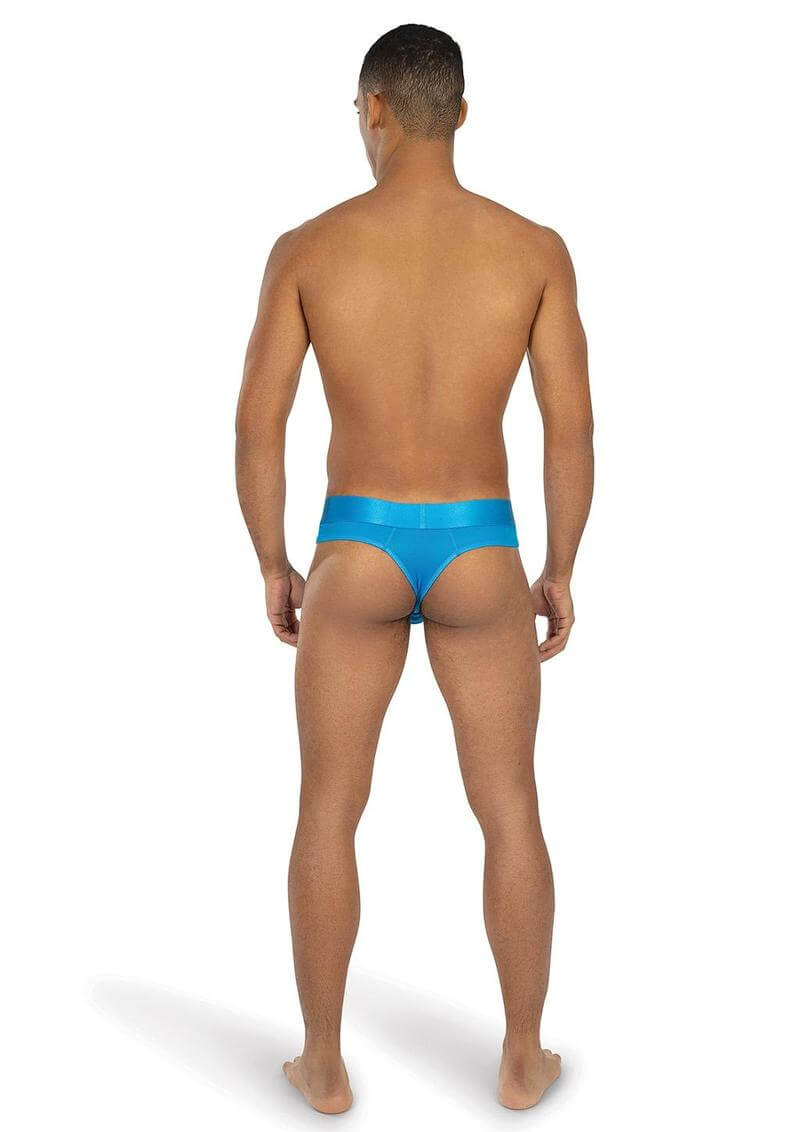 A man wearing the Envy Artic Bolt Thong Blue Small Medium from the back, showcasing its vibrant arctic blue color and sleek design.
