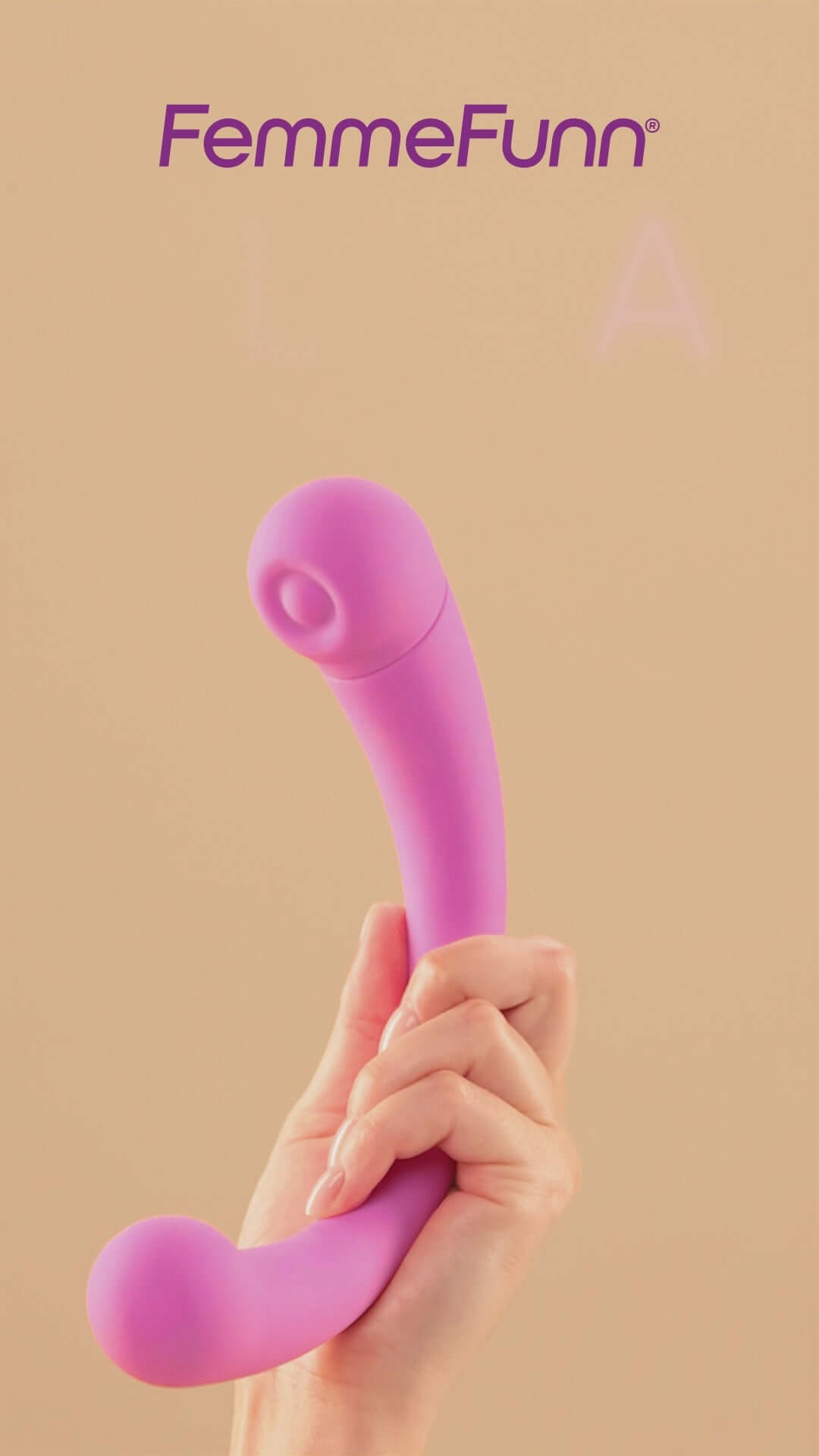 FemmeFunn Dual Stimulating Arc Vibrator Aluna Pink held in hand against a neutral background.