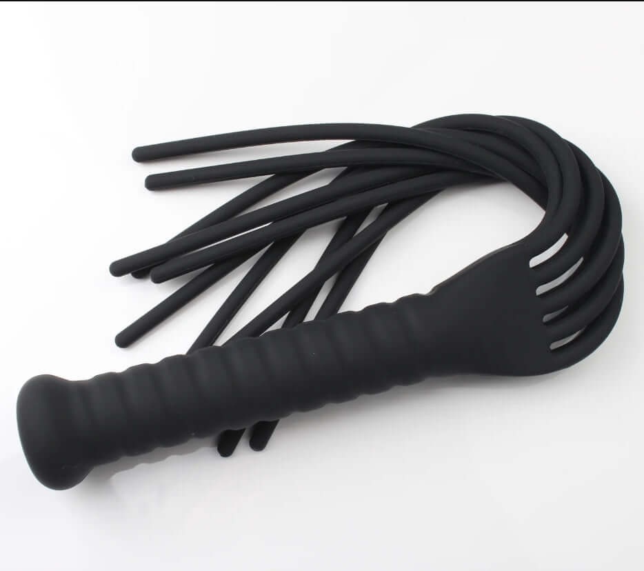 Fun-Mates Silea Silicone Whip Flogger with a comfortable grip handle and flexible silicone tails, perfect for playful sensations.