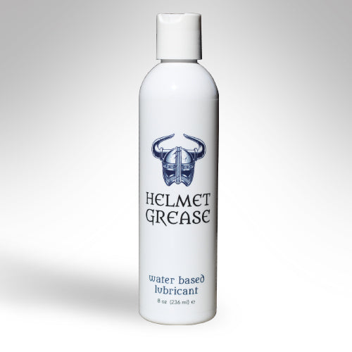 Helmet Grease Water Based Lubricant 8 Oz bottle with a sleek design featuring a logo and product information.