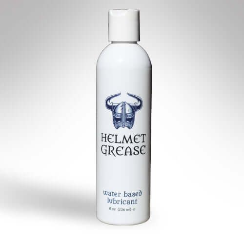 Helmet Grease Water Based Lubricant 8 Oz bottle with a sleek design featuring a logo and product information.