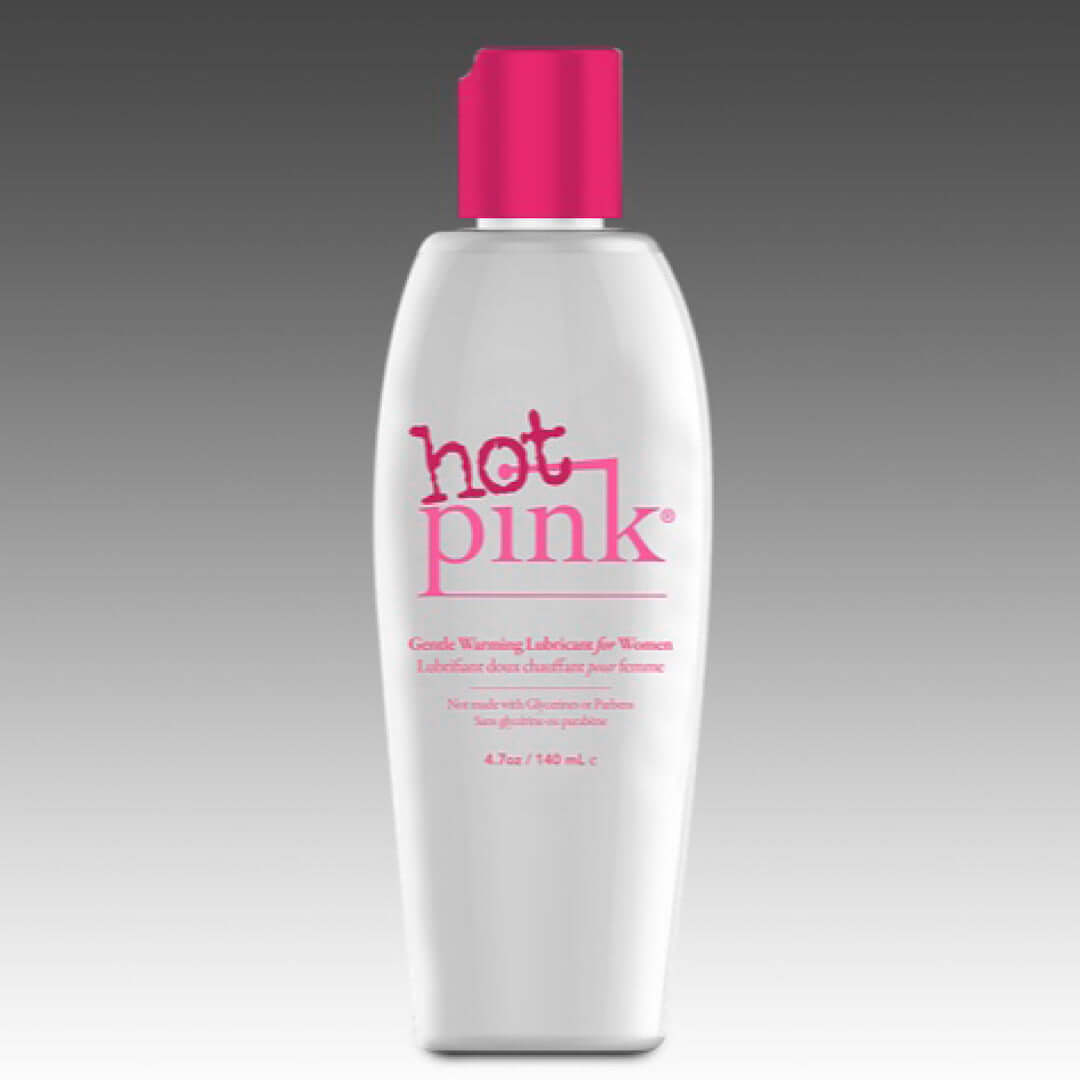 Hot Pink Warming Lubricant for Women 4.7 Oz bottle with pink cap on gray background