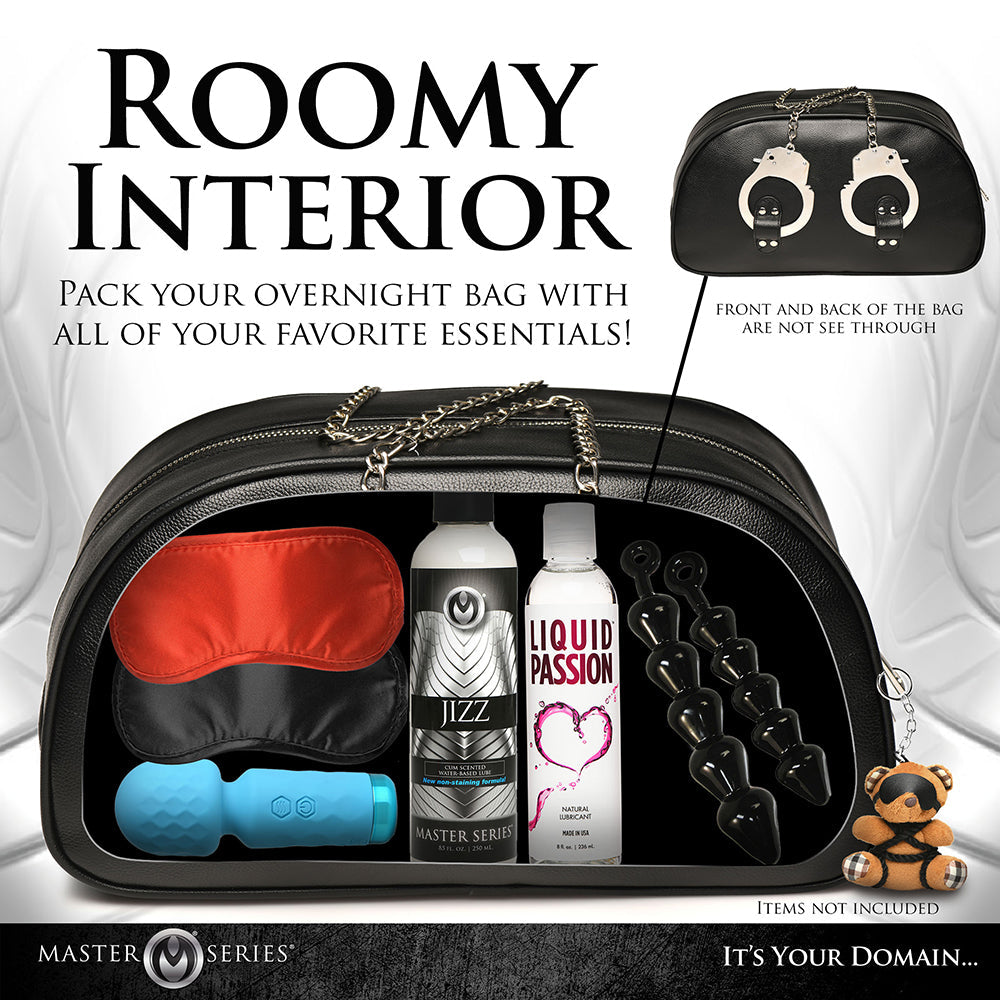 Roomy interior of the Master Series travel bag, showcasing storage for overnight essentials and bondage accessories.