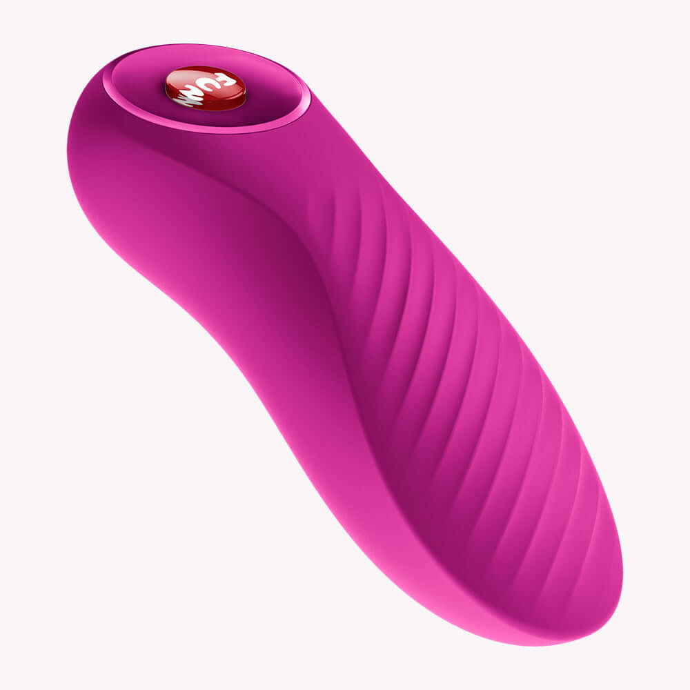 Fun Factory Bijou Bullet Vibrator Magenta showcasing its wavy texture and compact design for powerful stimulation.
