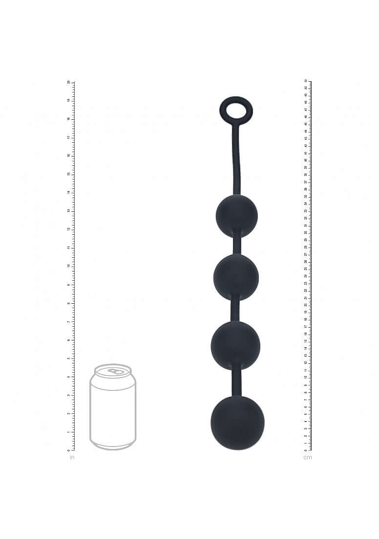 Levelz Round Silicone Anal Balls Xl 50mm Black displayed alongside a measurement scale for size reference.